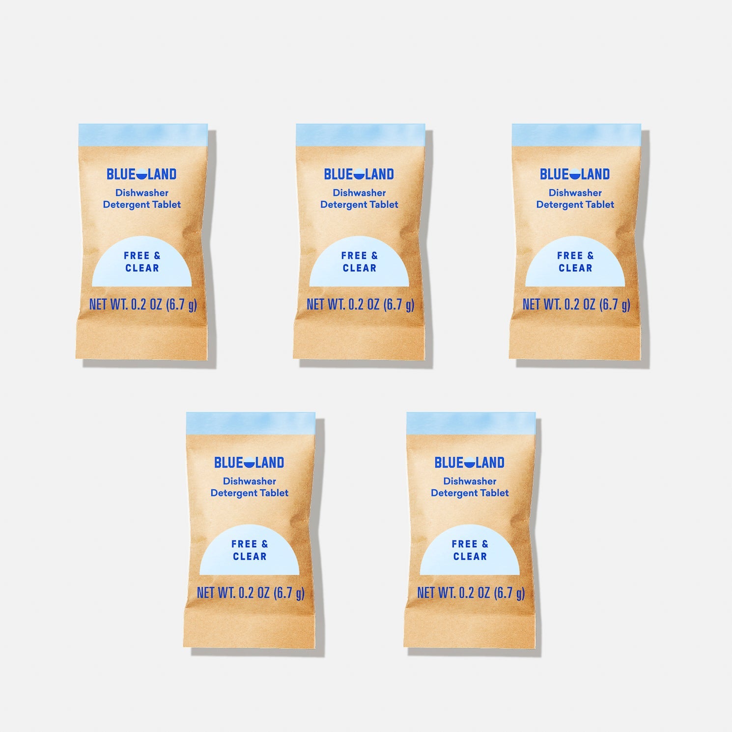Four brown packets labeled Blueland Dishwasher Detergent Sample Pack (5 Tablets) are shown. In front is a dry white tablet with a blue center to make dishes sparkling clean. The fragrance-free product weighs 0.67 g per packet.