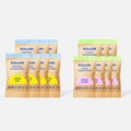 The Dishwasher + Laundry Detergent Sample Pack (14 Tablets – 7 Each) is shown in twelve brown paper pouches, featuring laundry detergent tablets (Spring Bloom) and dishwasher detergent tablets (Lemon Zest Scent) in front.